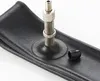 Close-up of a bicycle inner tube valve and cap. Produktbild-Vorschau