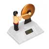 A digital alarm clock with a figure striking a gong. Náhľad obrázku produktu