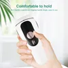 A person's hand holding a white and black hair removal device. Podgląd zdjęcia produktu