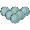 A group of six blue plates with brown rims are arranged in a semi-circle on a white background. Produktbild-Vorschau