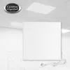 A white infrared heating panel is mounted on a white ceiling, with a power cord and plug visible at the bottom right. Produktbild-Vorschau