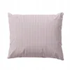 A pillow with a striped pattern on a white background. Anteprima dell’immagine prodotto