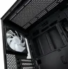 Interior view of a computer case, showing a fan and internal mounting points. Produktbild-Vorschau
