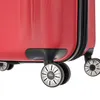 Close-up of the wheels and bottom corner of a red suitcase. Produktbild-Vorschau