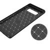 The back of a black phone case with a geometric pattern. Produktbild-Vorschau