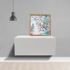A floating white nightstand with a framed picture of flamingos and tropical leaves on top, against a gray wall. Produktbild-Vorschau