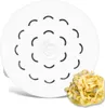 A white pasta maker disc with a small pile of cooked pasta. Produktbild-Vorschau