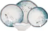 A set of ceramic plates and a bowl with a unique, abstract design. Voir les images du produit