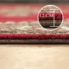 Close-up view of the edge and thickness of a rug, with a circular inset showing a measurement. Produktbild-Vorschau