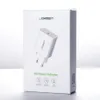 The image shows the retail packaging of a Ugreen USB charger. Náhled obrázku produktu