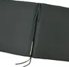 A close-up view of a dark gray cushion with a zipper partially open, revealing a cream-colored interior. Produktbild-Vorschau