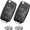 Two black car key fobs and two coin cell batteries are shown against a white background. Produktbild-Vorschau