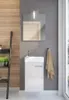 A modern bathroom vanity with a sink and mirror, set against a gray wall with wooden paneling on the left. Náhled obrázku produktu