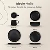 A diagram showing different sizes of black ceramic tableware, including cups, bowls, and plates, with measurements indicated. Voir les images du produit