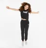 PUMA Ess+ Metallic Logo Knotted T-Shirt Mädchen puma black Produktbild-Vorschau 2