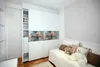 A bedroom with a white wardrobe and a daybed with stuffed animals. Náhľad obrázku produktu