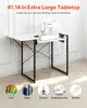 A white sewing table with a sewing machine on it, placed against a white wall. Produktbild-Vorschau