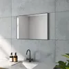 A modern bathroom sink area with a mirror above it. Produktbild-Vorschau
