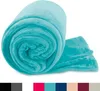 A rolled-up teal blanket on a white background. Produktbild-Vorschau