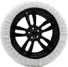 A snow sock is fitted onto a car wheel. Náhled obrázku produktu