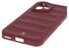 A close-up, angled view of a burgundy phone case with a textured back and a raised camera bump. Produktbild-Vorschau