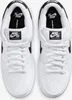 A top-down view of a pair of white Nike SB Dunk Low Pro sneakers with black accents. Anteprima dell’immagine prodotto