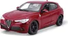 A red Alfa Romeo Stelvio model car is shown from a three-quarter front angle on a white background. Podgląd zdjęcia produktu