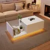 A modern living room with a couch, coffee table, and fireplace. Náhľad obrázku produktu
