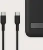 Two black USB-C cables are shown next to a black power bank. Voir les images du produit