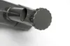 Close-up of a gray cap with an arrow symbol on a pipe. Produktbild-Vorschau
