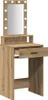 A makeup vanity table with a mirror and lights. Voir les images du produit