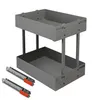 A two-tier gray cabinet organizer with two drawer slides in the foreground, set against a white background. Voir les images du produit