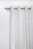 A white sheer curtain hanging from a silver curtain rod against a white wall. Produktbild-Vorschau