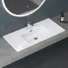 A modern bathroom sink with a faucet and a round illuminated mirror above it. Produktbild-Vorschau