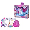 A product shot of a My Little Pony toy set, including the toy, accessories, and packaging. Náhled obrázku produktu