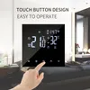 A hand is shown interacting with a smart thermostat display in a bedroom setting. Produktbild-Vorschau