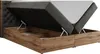 A bed frame with the mattress lifted to show storage compartments underneath. Produktbild-Vorschau