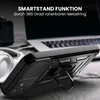 A black phone case with a ring stand is shown on a desk next to a laptop and headphones. Produktbild-Vorschau