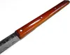 A close-up view of the handle and part of the blade of a kitchen utensil. Produktbild-Vorschau