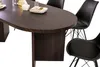 A close-up view of an oval dining table with dark wood finish and black chairs. Produktbild-Vorschau