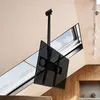 A TV mounted on a ceiling mount in a room with slanted ceilings and skylights. Produktbild-Vorschau