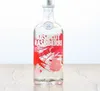 A bottle of Absolut Raspberri vodka is displayed on a wooden surface against a white background. Produktbild-Vorschau