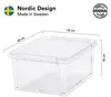 A clear, well-lit image of a transparent storage box with dimensions indicated by lines and text. Produktbild-Vorschau