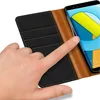 A hand is shown interacting with a smartphone inside a wallet-style case. Náhľad obrázku produktu