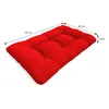 A red tufted cushion with dimensions indicated. Produktbild-Vorschau