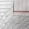 Designerski dywan z minimalistycznym łukowatym wzorem w Podgląd zdjęcia produktu 9