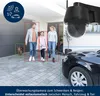 A family and a cat are detected by a security camera in front of a garage and a car. Produktbild-Vorschau