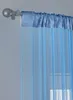Close-up of a blue string curtain hanging from a curtain rod. Produktbild-Vorschau