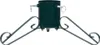 A dark green metal Christmas tree stand with four decorative legs, shown against a white background. Náhled obrázku produktu