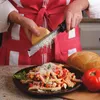 A person is grating cheese over a plate of pasta. Anteprima dell’immagine prodotto